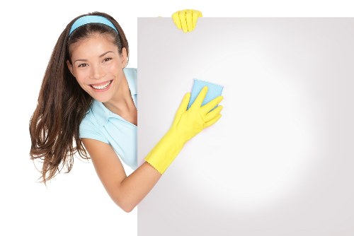 Hampstead cleaning specialist performing a deep clean in a bright room